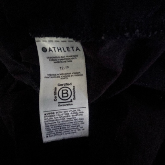 Athleta Women's Black Salutation Joggers with Zippered Pockets. Size 12p - Picture 5 of 5